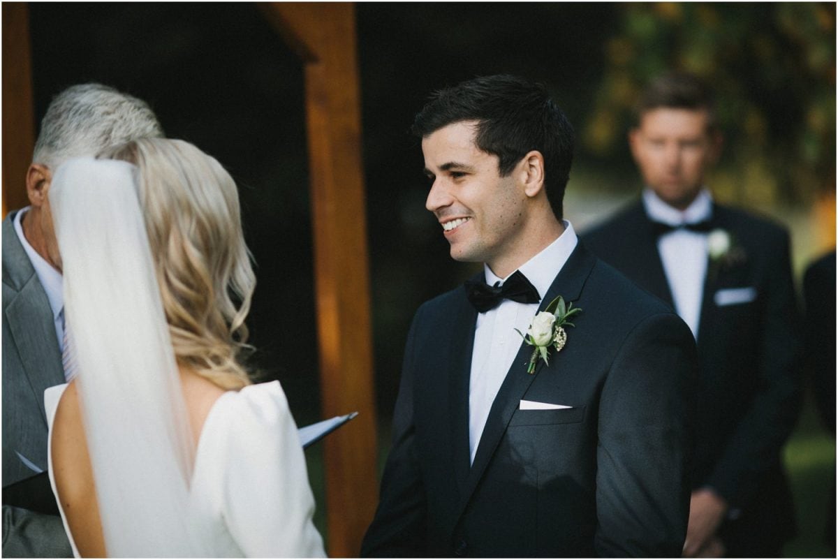 A groom during his wedding vows